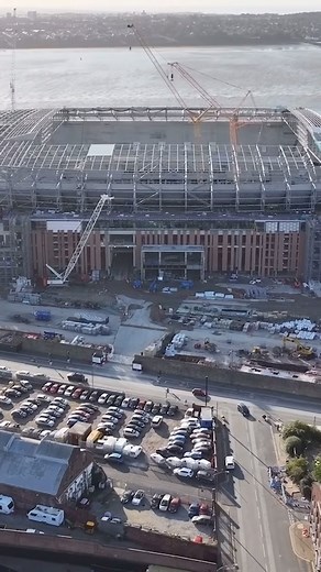 StadiumDB.com on Instagram: "Everton Stadium, UK 🇬🇧 ————————— Follow @stadiumdbcom for daily stadium content ————————— The construction of Everton’s stadium began with an impressive feat of engineering. A partially damaged dock was filled with 480,000 cubic metres of sand dredged from the sea to create solid foundations for the new facility. Situated on the banks of the River Mersey, the under-construction stadium, with a future capacity of 52,888 spectators, showed the ambition of the club, w