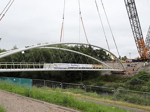 Massive new bridge over the River Severn is craned into place