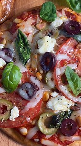Try our “Pita Bread Pizza” for a quick, delicious lunch, or snack. We layer PIZZA SAUCE, shredded CHEDDAR CHEESE, crumbled FETA, OLIVES, and sliced ORGANIC TOMATOES ON THE VINE on top of PITA BREAD. After baking, we top with some PINE NUTS and FRESH BASIL LEAVES and drizzle with OLIVE OIL | Ingles Markets