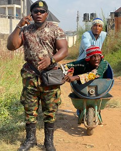 The soldiers money bag | Gozie D Yellow