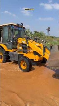 JCB 3DX back bucket loading railway big concrete