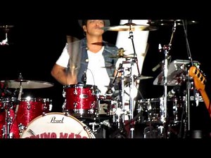 Bruno Mars playing the drums