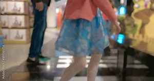 Children have fun by pushing the huge musical keyboard in the floor, which is illuminated by light and plays a melody.