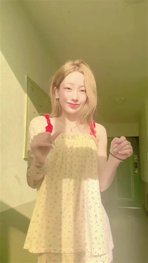 Exploring Unique Hand Gestures in a Floral Dress