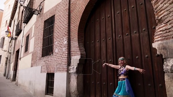 Senior belly dancer in a traditional costume performing graceful movements on an old european street. Slow motion shot of a mature woman dancing Stock Video Footage - Alamy