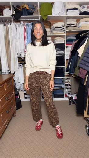 Karen Harrow on Instagram: "Animal print jeans, a sweater and sneakers Comment SHOP below to receive a DM with the link to this post on my LTK ⬇ https://liketk.it/5HGb7"