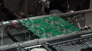 Electronic circuit board production. Automated Circut Board machine Produces Printed digital electronic board. Electronics contract manufacturing. Manufacture of electronic chips. High-tech. hd