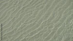 Sand ripples created by shallow waves