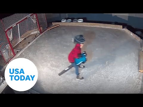 Little hockey player practices on ice with skates and a leaf blower | USA TODAY