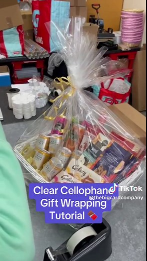 Clear Cellophane Gift Wrapping Tutorial 🍫 #giftwrapping #giftwrappinghacks #wrappinggifts #wrapping #wrappinghacks #cello #cellophane #fyp #cellowrap #wrappinghamper #hamperwrapping