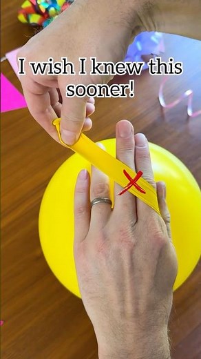 How to tie a ribbon onto a balloon! #partydecor #balloons #birthday