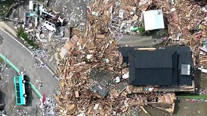 Masks, disinfectant and social distancing as Japan deals with devastating floods amidst a global pandemic. https://reut.rs/2Z7YoKu | Reuters