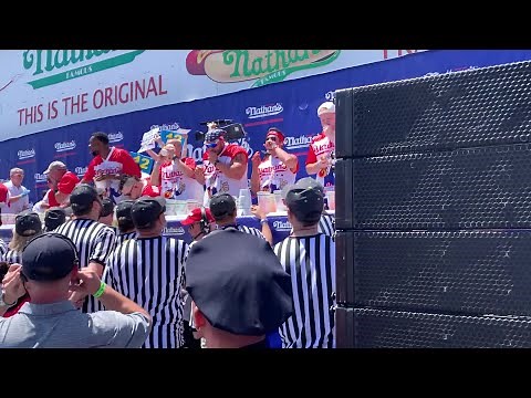 Nathan's Hot dog eating contest protestors run on stage