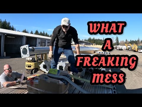 LIGHT POLES FOR SEATTLE WASHINGTON/ SOLO FLATBED TRUCKER/ PRIME INC