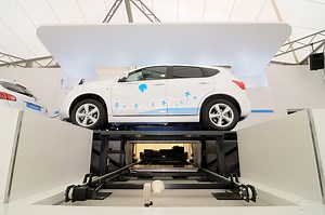 Watch a Robot swap out batteries from this electric vehicle [VIDEO]