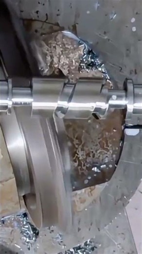 Witness the Greatness of a CNC Machine Carving a Metal Rod into a Perfect Screw Thread Shape