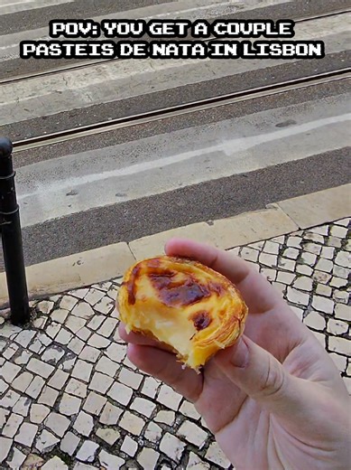 pov pastel de nata in Lisbon #lisbon #portugal #travel #foodie #pasteldenata