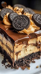Peanut Butter Oreo Ganache Delight Cake ### **Ingredients** #### **For the Oreo Crust** * 2 cups Oreo cookie crumbs * ½ cup unsalted butter, melted #### **For the Peanut Butter Layer** * 1 cup creamy peanut butter * 1 cup powdered sugar * 1 teaspoon vanilla extract #### **For the Chocolate Ganache** * 1 cup heavy cream * 8 oz semi-sweet chocolate, chopped #### **Optional Topping** * ¼ cup peanut butter, melted (for drizzle) --- ## **Instructions** ### **Prepare the Crust** 1. Mix Oreo crumbs wit
