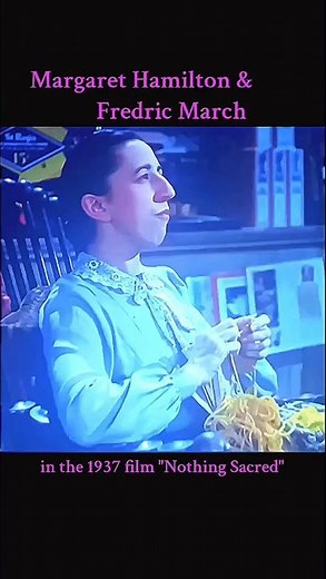 Margaret Hamilton and Fredric March in a funny scene from the 1937 film "Nothing Sacred'