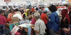 VIDEO: Woman falls into towel box during Walmart Black Friday shopping