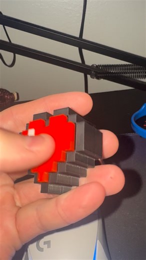 Bring a pixel of joy everywhere you go! 💖🗝️ This clicky Minecraft heart keychain is the perfect accessory for gamers and 3D-printing fans alike—crafted with vibrant, professional-grade filament to really make those classic pixels pop! Level up your everyday carry—clip it to your keys, backpack, or gift it to a friend who deserves an extra life. Click, fidget, play—show your love for the game with every pixel! #Minecraft #3DPrinting #LevelUpYourKeys #GamerGift #PurgedPrints #hearts #clicky | Pu