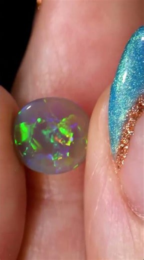 0.85ct Natural Black Crystal Opal Oval Lightning Ridge