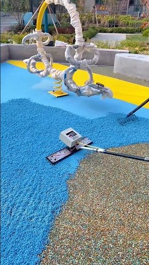 Installing EPDM Flooring: Applying Colored Rubber Chips for an Outdoor Area