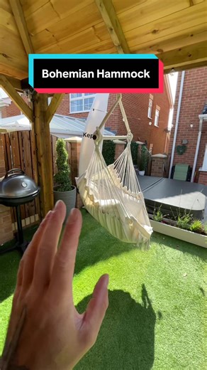 Garden seat hammock – perfect for hanging from a tree, pergola or inside your home. Comfy, stylish garden furniture upgrade. #GardenHammock #GardenFurniture #OutdoorLiving #GardenVibes #HammockChair #PergolaStyle #GardenGoals #TikTokMadeMeBuyIt #dealdrop