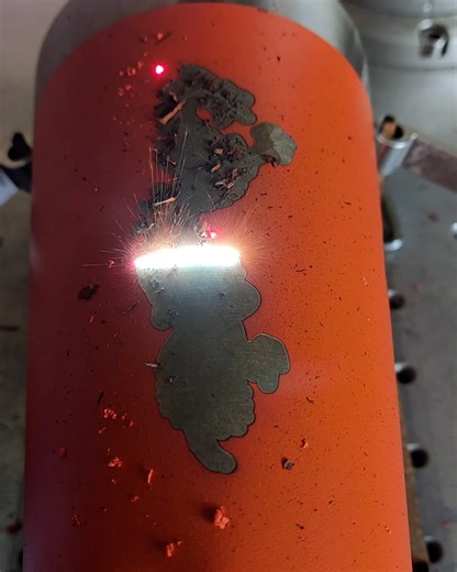 Laser engraving to hide scratches