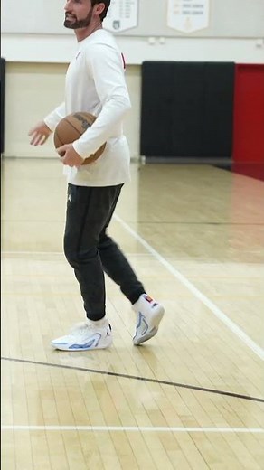 Between the Leg Step Cross Dribbling Drill