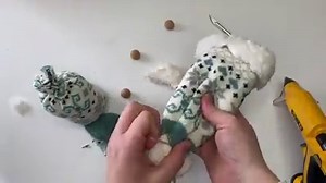 2.9K views · 26 reactions | FINALLY getting around to actually sharing a popular design, the gnome with a coffee cup. This one is fun, quick, and uses the fluffiest of fluffy socks. For the full tutorial, visit YouTube or https://rufflesandrainboots.com/sock-gnome-holding-a-coffee-cup/ | Ruffles And Rain Boots | Facebook