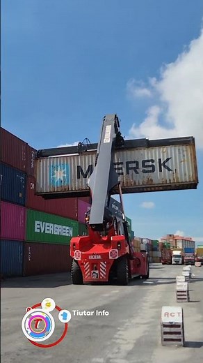 Kalmar Reach stacker with a tilting spreader for container handling