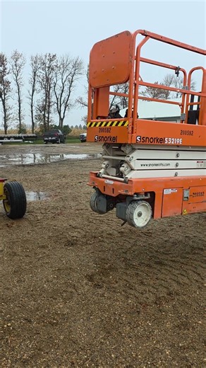 easy way to move a scissor lift