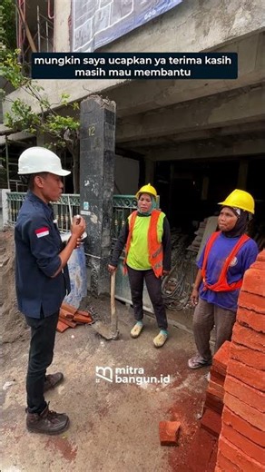 The housebuilder builds a simple minimalist 2-story house using red bricks