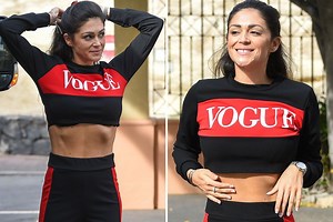 Casey Batchelor displays her toned tum in Tenerife after four stone weight loss