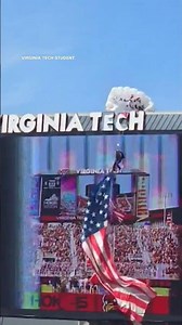 Parachutist rescued after getting stuck on scoreboard