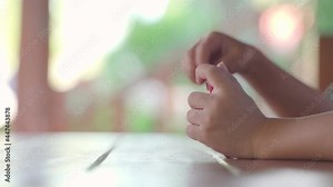 Asian boy about 3 years and 10 months addiction and keep using mobile phone for watching cartoon application