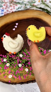 Easter treats. How sweet are these mini chick cluck-cake bites 🐥 Mommy hen needed her chicks! I used mini heart confetti sprinkles for the beak, black non pareils for the eyes and orange jimmies for the feet. You can see how to make the hen in my previous reel. 💕 #spring #springbaking #springtreats #springbaby #easter #eastertreats #easterbaking #cupcake #cupcakes #cupcakedecorating #cakedecorating #chicks #easterchick #easyrecipes #cake #cakes #dessert #sweets | beautyanddasweetz