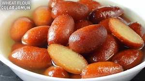 1.1M views · 23K reactions | With just 1/2 cup Wheat flour (Atta) make 1 kg halwai style soft-juicy Gulab Jamun. You'll love it! :) | Papa Mummy Kitchen | Facebook