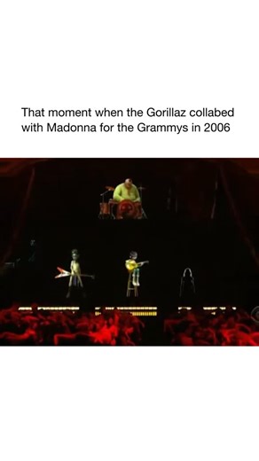 Good Music on Instagram: "At the Grammy Awards, Madonna performed a special collaboration with Gorillaz. The performance mixed live action with animation and hologram-style visuals, which was unusual and technically impressive at the time. Madonna sang “Hung Up” live on stage while animated versions of Gorillaz appeared on screens performing Feel Good Inc.. The Gorillaz members were not physically present; instead, their animated characters were projected, staying true to the band’s virtual iden