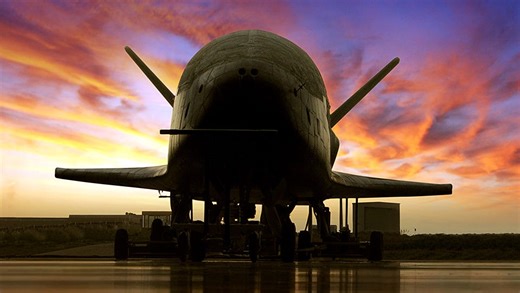 X-37B is a secret military space plane. Pictures show what it looks like before, after launch
