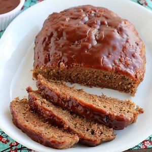 46K views · 89 reactions | This SLOW COOKER MEATLOAF has a delicious savory-sweet brown sugar and balsamic glaze on top, and is cooked on a sheet of parchment paper that easily lifts the meatloaf out of the slow cooker when it’s done cooking. RECIPE --> https://www.dessertnowdinnerlater.com/slow-cooker-meatloaf/ | Dessert Now, Dinner Later | Facebook