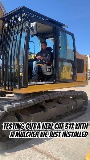 New CAT 317 with mulcher head installed for forestry