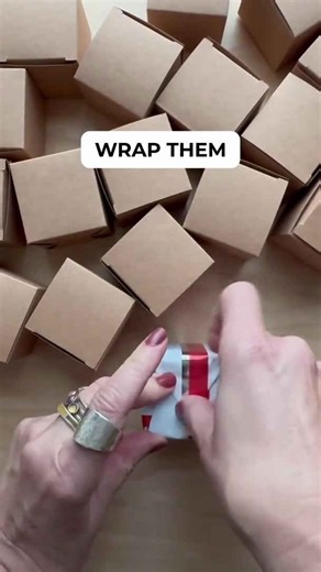 Buy mini cardboard boxes from the Dollar Store for this genius holiday idea!
