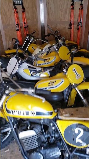 Trailer load of abandoned 70's Yamaha dirt bikes
