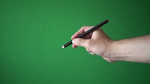 Man Holding Pencil His Hand Isolated Stock Footage Video (100% Royalty-free) 1056221816 | Shutterstock