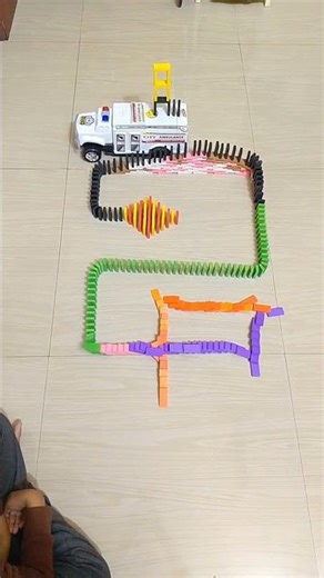 Slow motion domino effect #shorts #shortsfeed #slowmotiondominotrick #mesmerizingdominotricks #art