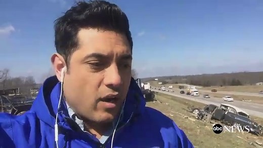 Tornadoes toss junkyard cars onto Missouri highway