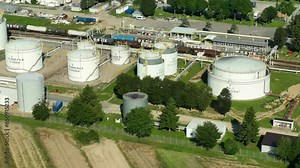 Fuel Transport by Rail - Engaging footage of trains transporting fuel, including gasoline, diesel, oil, and lubricants, ensuring a steady supply to a fuel dispensing facility.