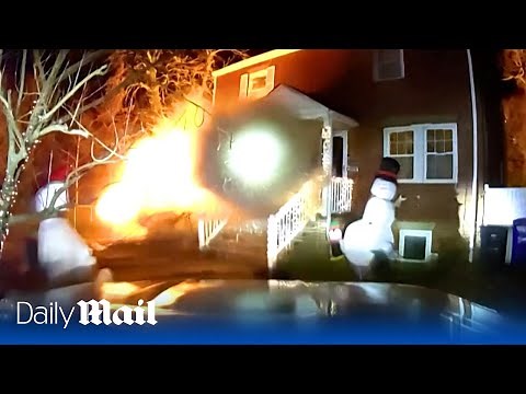 Terrifying new footage shows moment Virginia home explodes after man fires 30 flares at cops